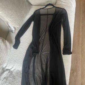 Black sheer pool cover-up.